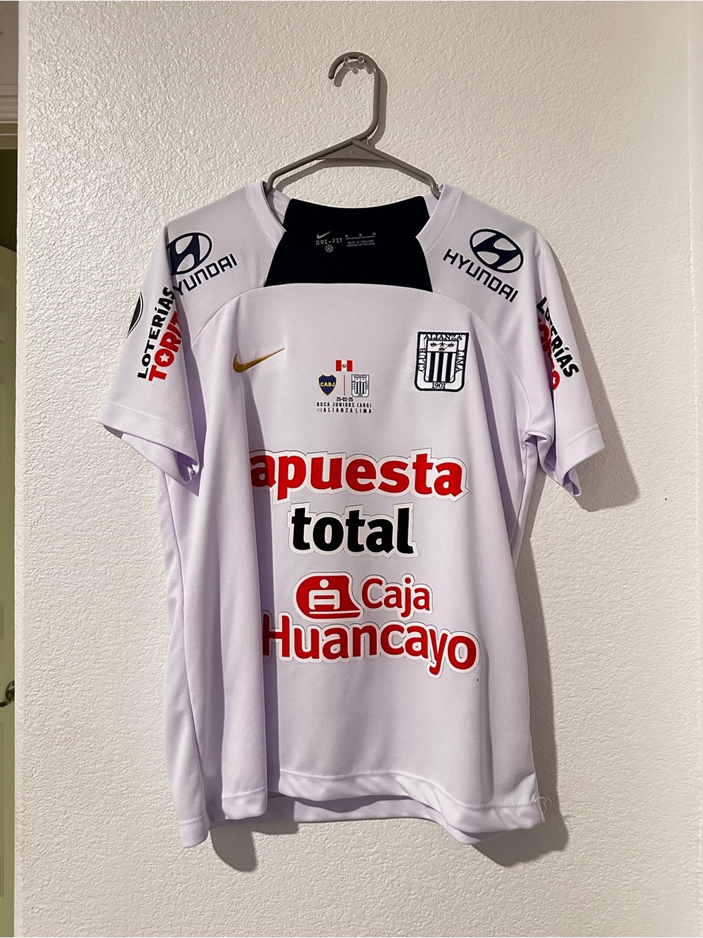 Nike White and Black Home Football Jersey with Red Sponsor Accents
